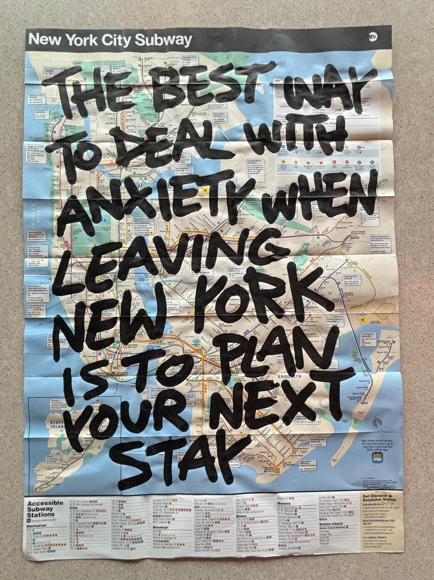 New York City Subway map with text on a plain background