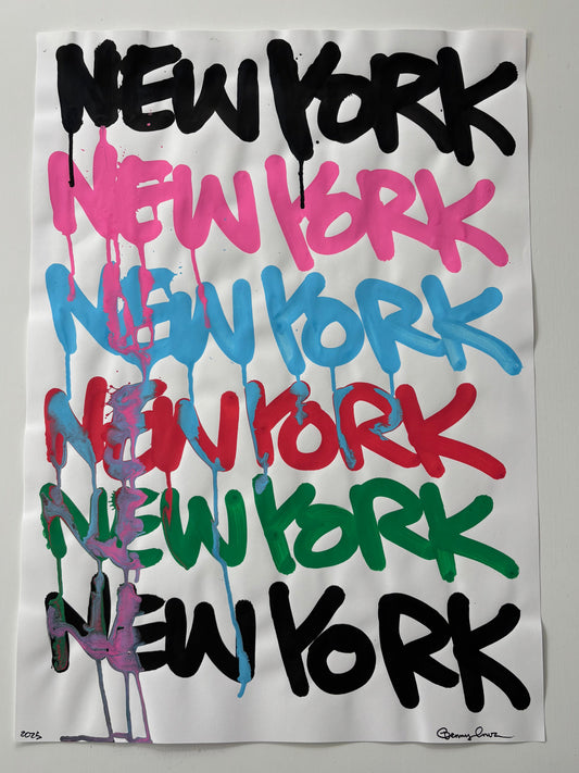 A square white art print or poster featuring the word 'New York' repeated vertically in bold brushstroke lettering in black, pink, blue, red, and green, with overlapping paint-like lines across the composition.