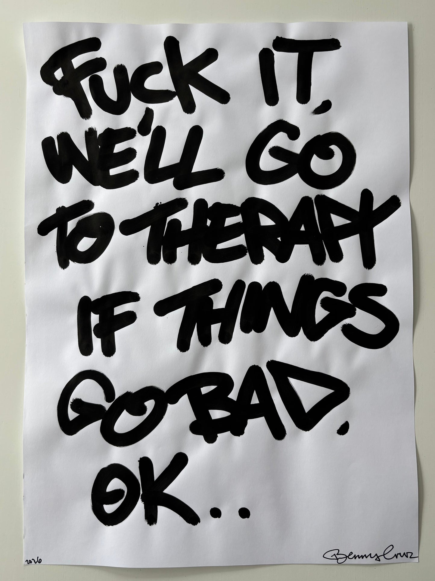 Sheet of paper with black text on a plain background