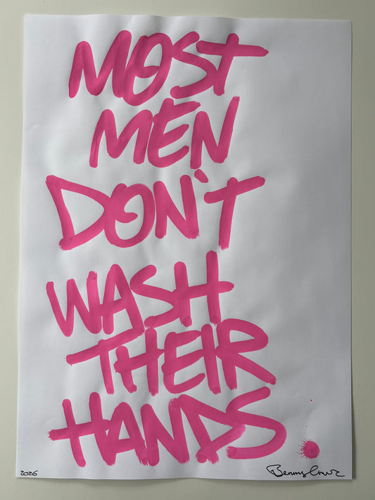 Sheet of paper with pink text on a plain background